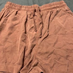 Brown and tan colored shorts